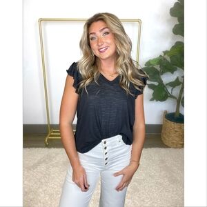 Brand new ruffle cap sleeve top